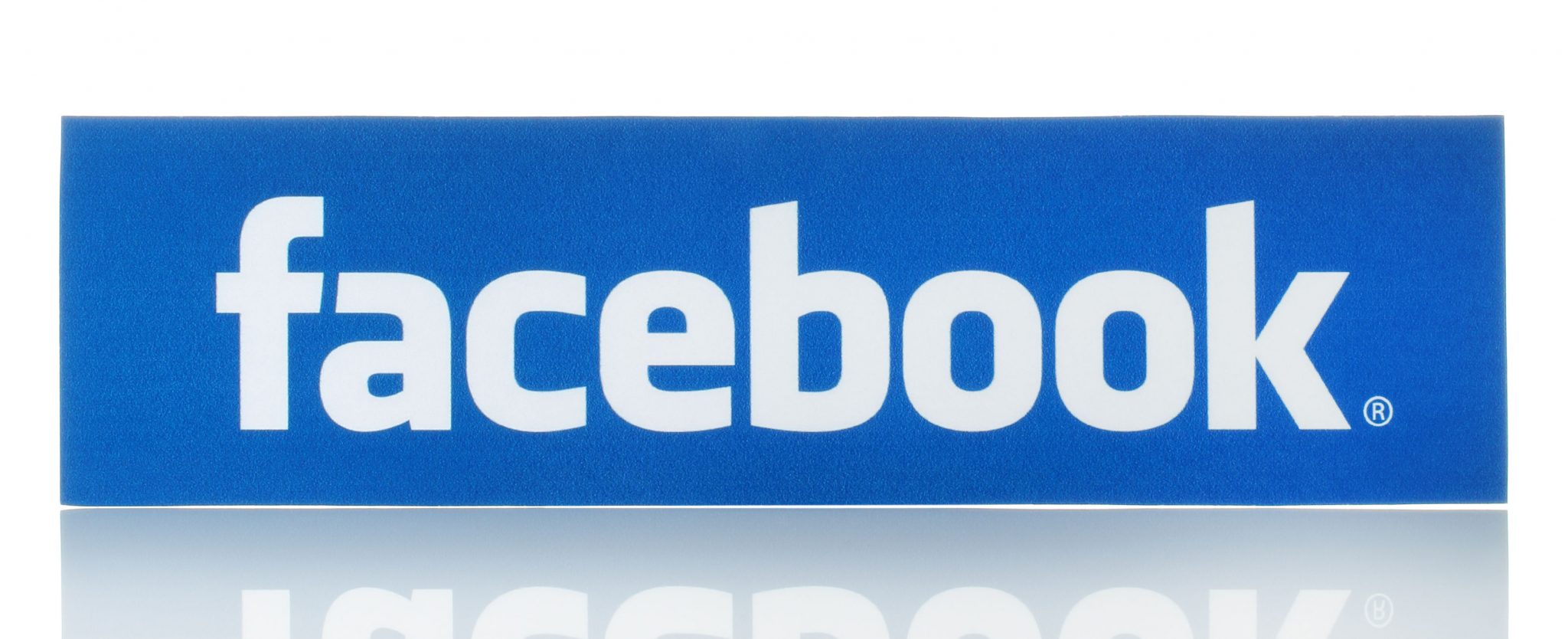37759329 - kiev, ukraine - february 19, 2015:facebook logo sign printed on paper and placed on white background. facebook is a well-known social networking service.